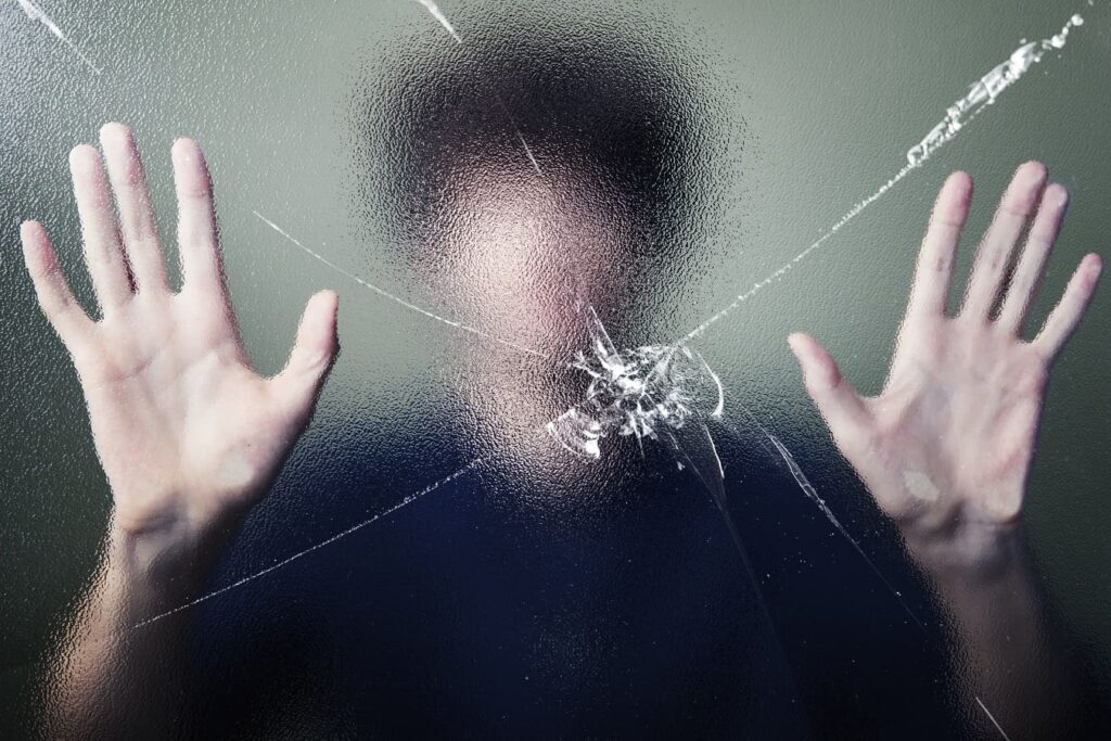 anonymous man with cracked glass effect1
