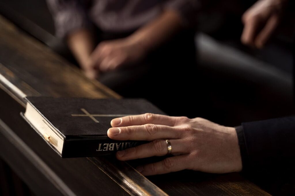 close up priest reading form bible1